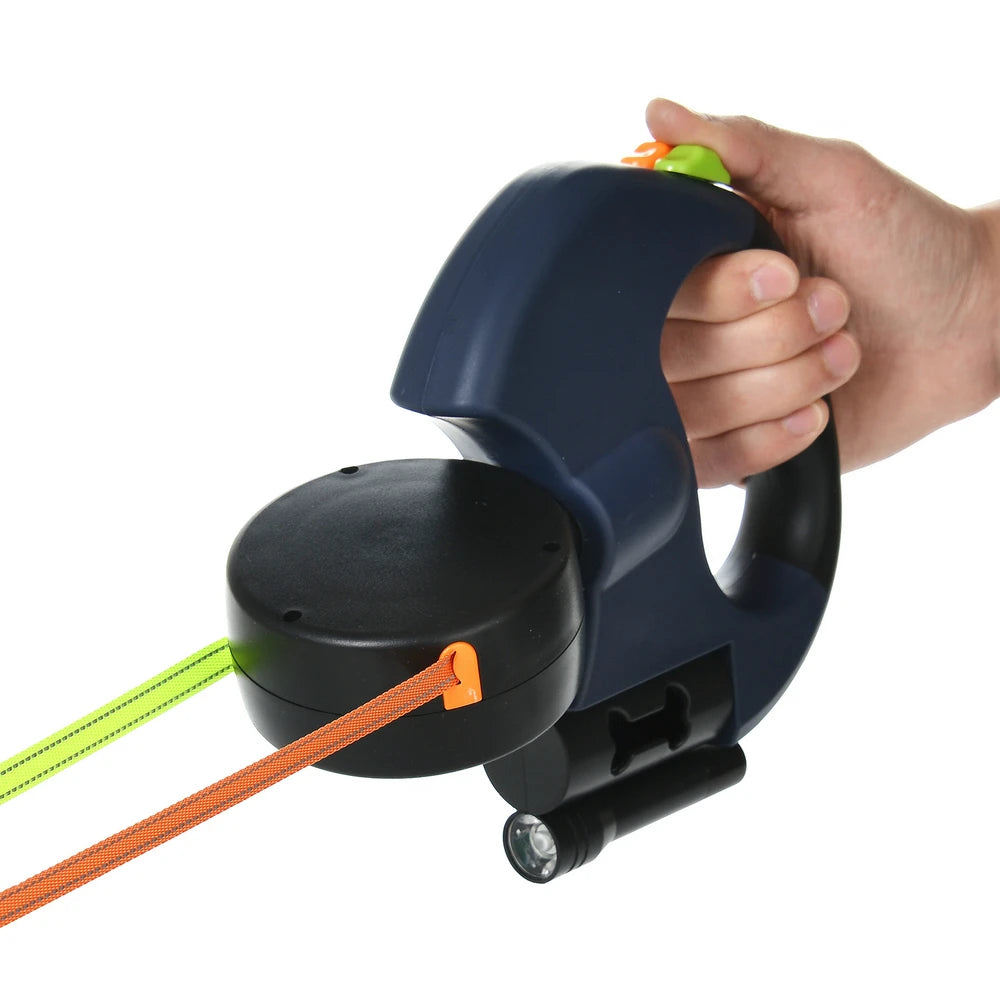 Integrated flashlight dual pet leash for illuminated paths and added security.