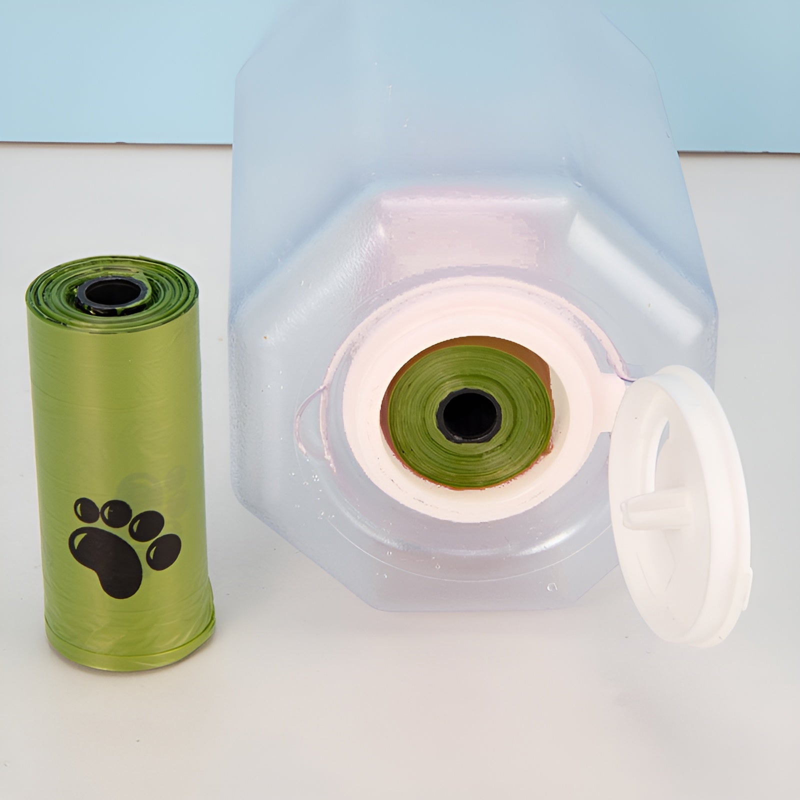 Compact and lightweight pet travel kit combining a water and food dispenser.